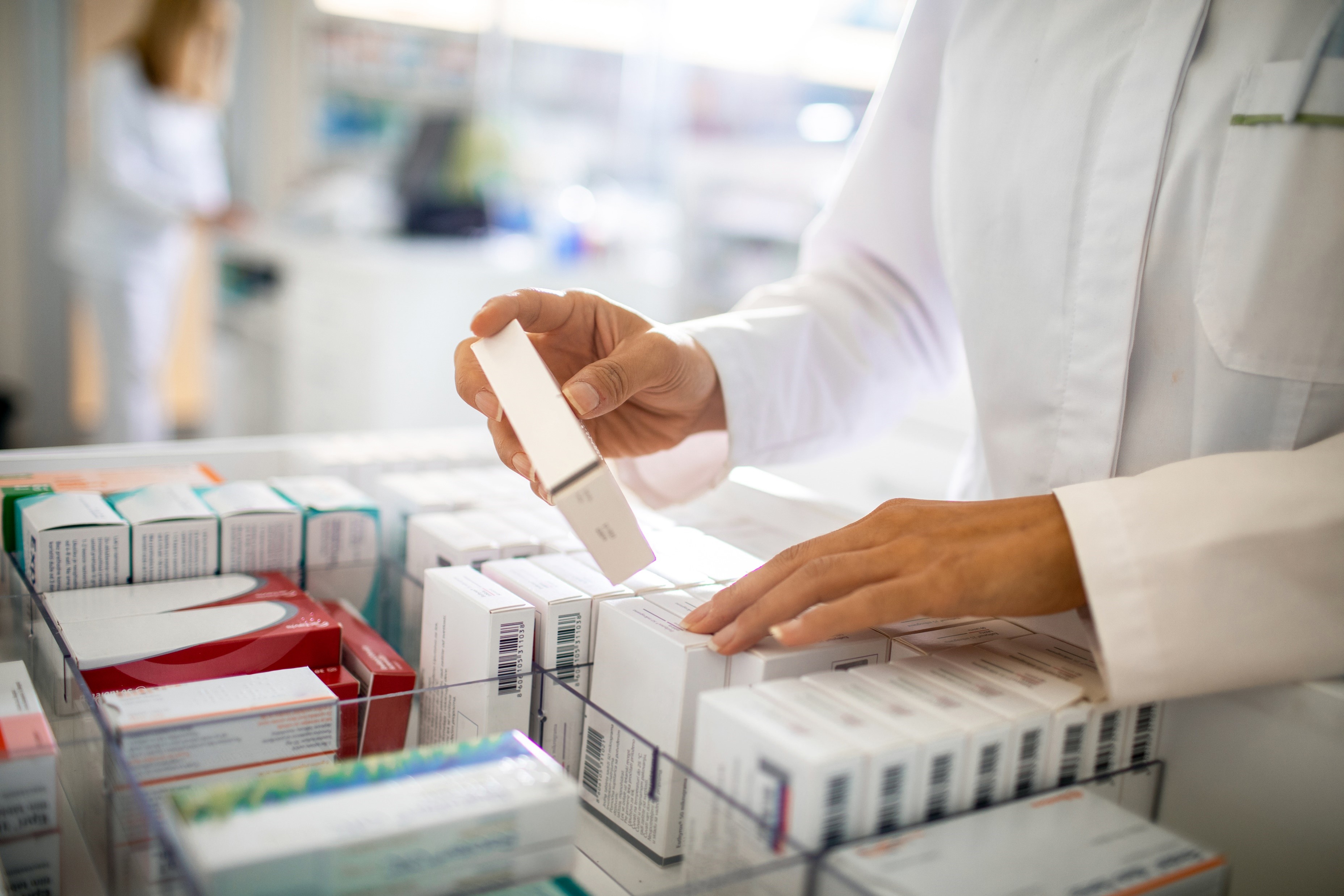 pharmacist behind the counter