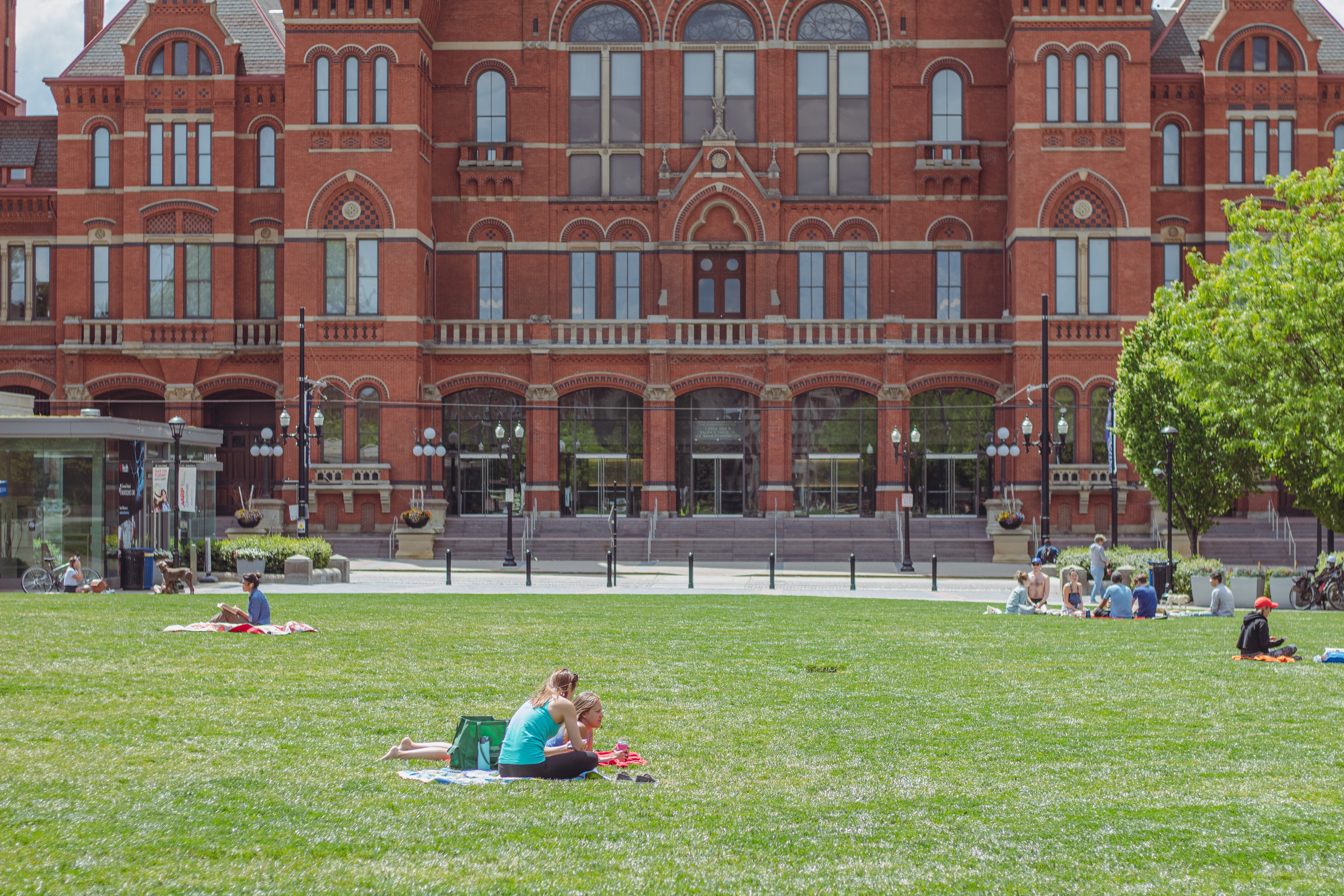 college campus with green quad in spring